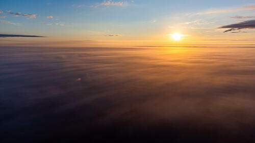 Sunrise above fog 2